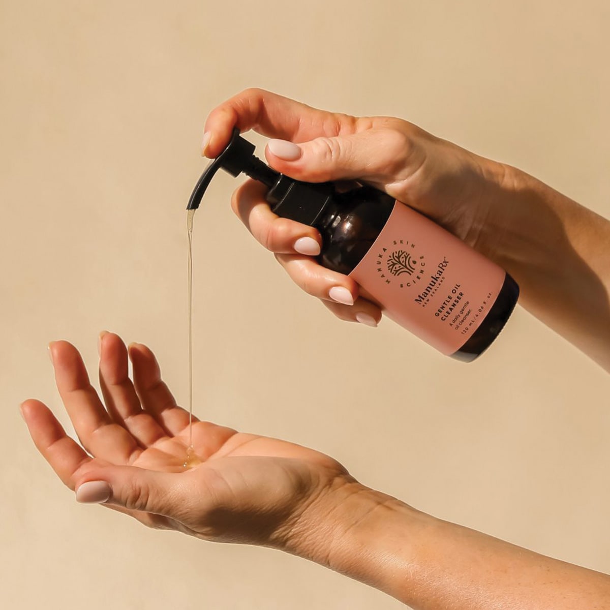 ManukaRx Gentle Oil Cleanser pumped into hand