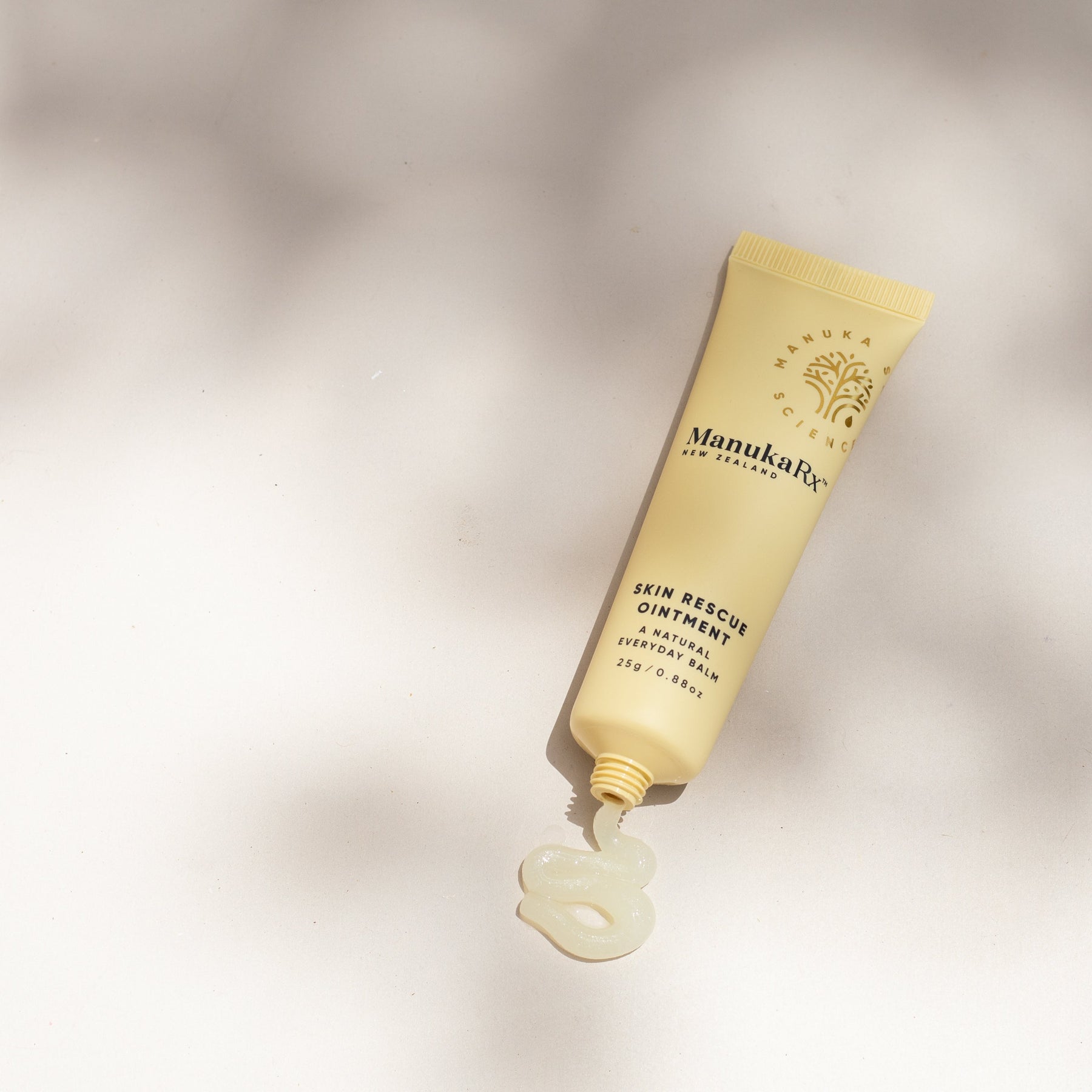 ManukaRx Skin Rescue Ointment tube with product coming out